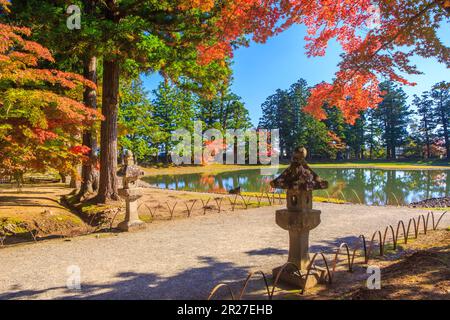 Motsuji temple Oizumigaike pond with autumn leaves Stock Photo