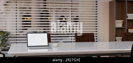 Close-up image of a laptop computer white screen mockup on a meeting table in modern meeting room. 3d render, 3d illustration Stock Photo