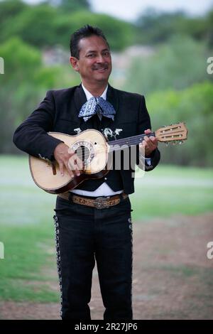 Mariachi musician playing his vihuela in Tucson, Arizona Stock Photo