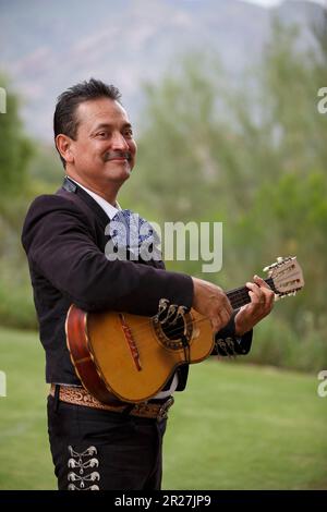 Mariachi musician playing a vihuela in Tucson, Arizona Stock Photo