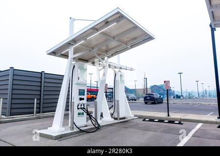 Calgary, Alberta, Canada. May 17, 2023. An electric car charging station. Stock Photo