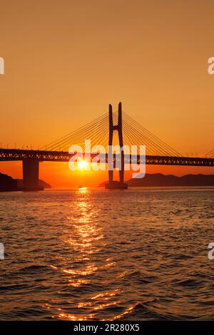 Seto-Ohashi bridge and the sunset, Iwakurojima Bridge Stock Photo - Alamy