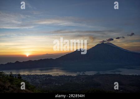 Sleeping volcano Gunung Agung in the morning sun of Bali Stock Photo