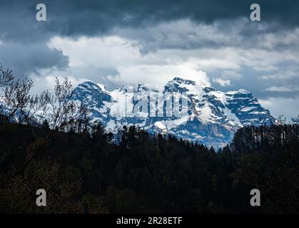 Look through of snow covered mountains in the Swiss Alps Stock Photo