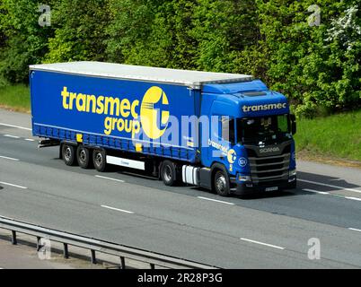 Transmec Group lorry on the M40 motorway, Warwickshire, UK Stock Photo