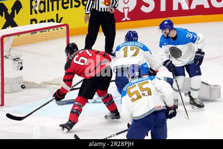 Riga, Latvia. 17th May, 2023. Canada's Lawson Crouse (L) scores during the Group B match between Canada and Kazakhstan at the 2023 IIHF Ice Hockey World Championship in Riga, Latvia, May 17, 2023. Credit: Edijs Palens/Xinhua/Alamy Live News Stock Photo