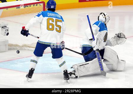 Riga, Latvia. 17th May, 2023. Kazakhstan's Nikita Boyarkin (R) fails to make a save during the Group B match between Canada and Kazakhstan at the 2023 IIHF Ice Hockey World Championship in Riga, Latvia, May 17, 2023. Credit: Edijs Palens/Xinhua/Alamy Live News Stock Photo