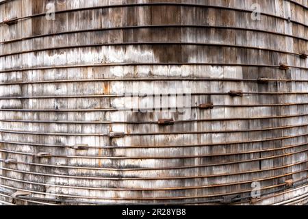 Close-up view of a water tank with  weathered wood and metal. Stock Photo