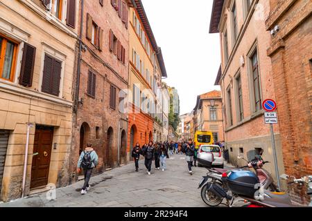 Siena, Italy - APR 7, 2022: Generic architecture and street view from the historical Italian city of Siena in Tuscany. Stock Photo