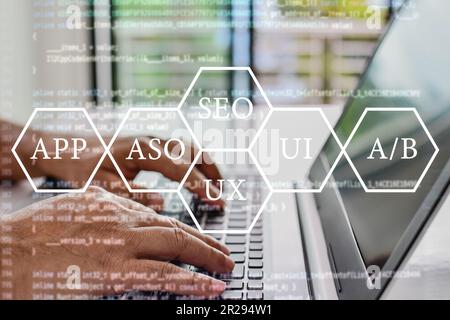 Developers work at home. Programmers write coding apps for use with business services on the Internet. Programmers sit and write programs with their l Stock Photo