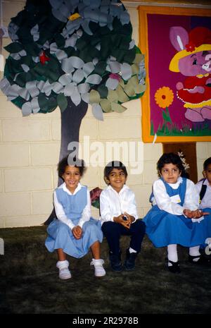 Abu Dhabi UAE Kindergarten Mixed Childrens Class Boy And Girl In School Uniform Stock Photo