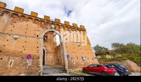 Siena, Italy - APR 7, 2022: Porta Romana is one of the portals in the medieval Walls of Siena. It is located on Via Cassia in Siena, region of Tuscany Stock Photo