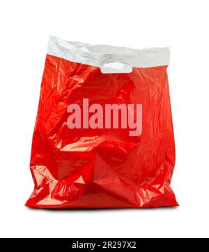 Close up of a used red plastic bag isolated on white background. With clipping path Stock Photo