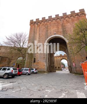 Siena, Italy - APR 7, 2022: Porta Romana is one of the portals in the medieval Walls of Siena. It is located on Via Cassia in Siena, region of Tuscany Stock Photo