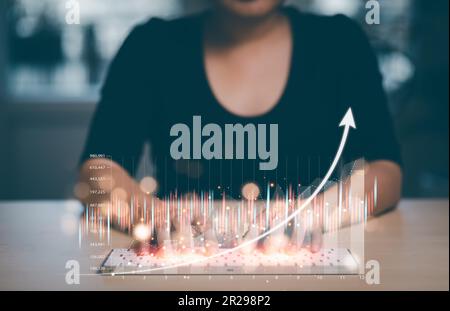 planning and strategy, Stock market, Business growth, progress or success concept. woman with trader is showing a growing virtual hologram stock, inve Stock Photo