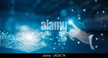 Businessman hand touch line virtual connect with Hand graphic, Wireframe light virtual world connection structure, virtual Hand graphic concept. Isola Stock Photo