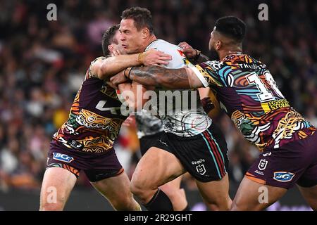 Scott Sorensen of the Panthers is tackled during the NRL Round 12 match  between the Brisbane Broncos and the Penrith Panthers at Suncorp Stadium in  Brisbane, Thursday, May 18, 2023. (AAP Image/Jono