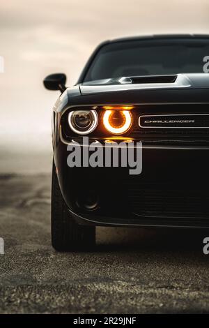 The Dodge Challenger is the name of three different generations of automobiles produced by American automobile manufacturer Dodge. Stock Photo