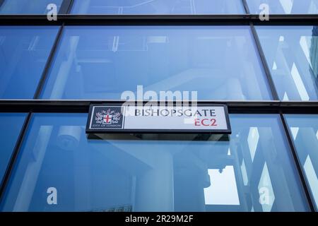 London- May 2023: Bishopsgate street sign on side of glass financial skyscraper building Stock Photo