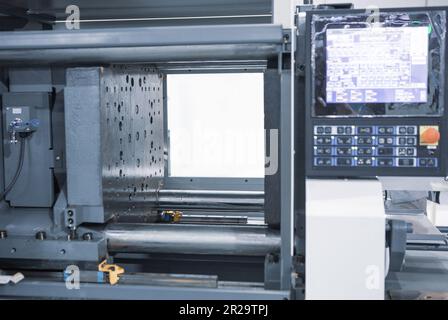 Plastic injection molding press machine. Industrial plastic manufacturing Stock Photo