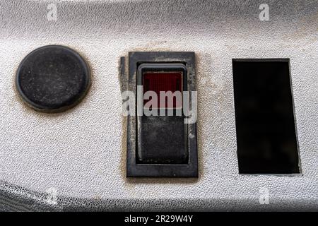 A tractor power button and status indicator light Stock Photo