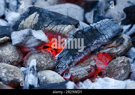 Details of charcoal for barbecue at picnic. Abstract background. Stock Photo