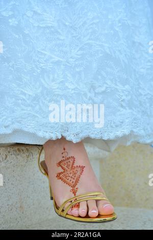 Moroccan henna tattoo on foot Stock Photo