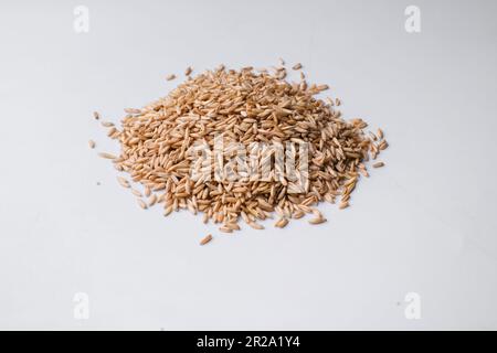 oat seeds heap isolated on white. top view with copyspace Stock Photo