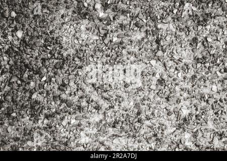 Concrete wall, floor. Porous texture, dark gray color. Rough texture of concrete, putty. Concrete surface. Textured wall. Stock Photo