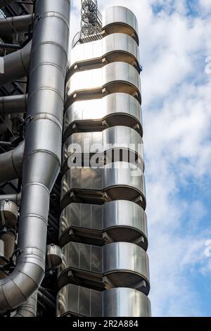 London, England-August 2022; Vertical view of the exterior of The Lloyd's building (Inside-Out Building) of insurance institution Lloyd's of London Stock Photo