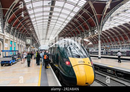 London, England-August 2022; View over the platforms with waiting trains of Paddington Station with Victorian style train shed architecture Stock Photo