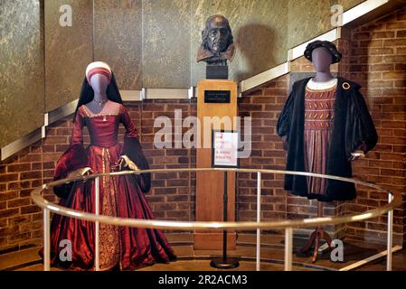RSC Theatre interior with display of traditional Tudor costume worn by Henry V111 and Anne Boleyn. Royal Shakespeare Theatre, Stratford upon Avon, UK Stock Photo