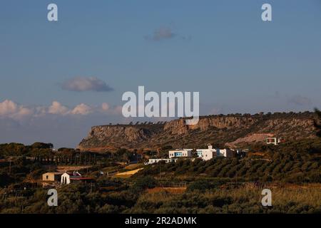Panoramic view of mountain range landscape in the evening light near Sisi,Lasithi, Crete, Greece Stock Photo