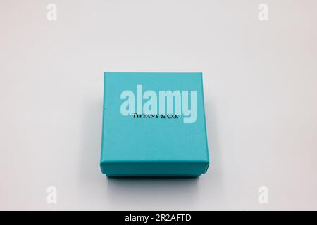 Tiffany & Co. blue jewellery boxes and pouches, isolated against white  background. Famous American jewelry store business headquartered in New  York Stock Photo - Alamy