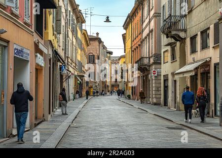 Glimpse of the Via Emilia that crosses the city between medieval palaces and shops. Reggio Emilia, Emilia ROmagna, Italy, Europe Stock Photo