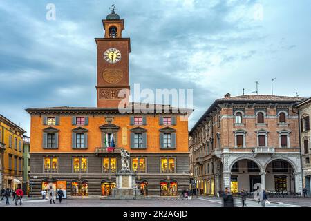 The ancient Palazzo del Monte di Pietà, now the headquarters of the Manodori foundation, with the bell tower and the Renaissance facade. reggio emilia Stock Photo