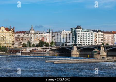 PRAGUE, CZECH REPUBLIC - AUGUST 24, 2022: Wide-angle view of the Dancing House in the Nove Mesto district in Prague, Czech Republic. Stock Photo