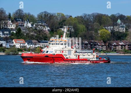 Hamburg, Germany - 04 17 2023: View of the fire-fighting boat Branddirektor Westphal on the Elbe in Hamburg. Stock Photo