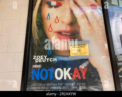 A warning sign for rat poison is seen on an old movie poster advertisment  in Chelsea in New York on Tuesday, May 9, 2023.  (© Frances M. Roberts) Stock Photo