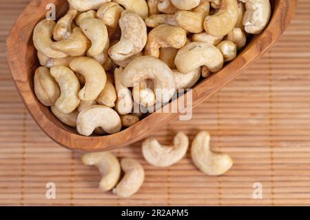 Cashews in a wooden bowl Stock Photo