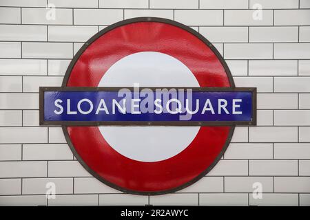 Sloane Square sign displayed at the London underground station. Stock Photo