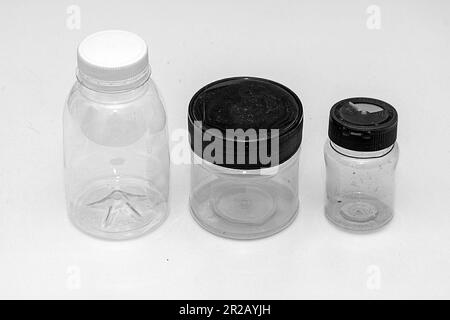 Empty closed plastic containers with lids isolated on white background Stock Photo