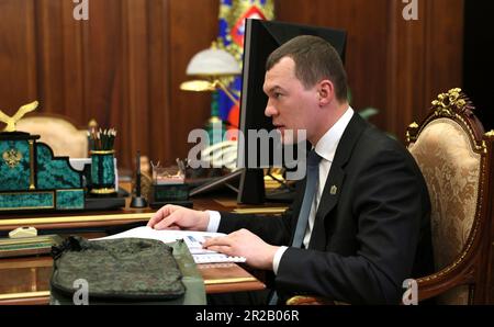 Moscow, Russia. 18th May, 2023. Khabarovsk Territory Governor Mikhail Degtyarev during a face-to-face meeting with Russian President Vladimir Putin at the Kremlin, May 18, 2023 in Moscow, Russia. Credit: Mikhail Klimentyev/Kremlin Pool/Alamy Live News Stock Photo