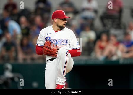 Texas Rangers Starting Pitcher Nathan Eovaldi Throws To The Atlanta ...