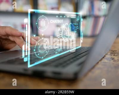 Artificial intelligence chatbot. A man chats at home with a smart AI, large language model. Future technology, business, and education Stock Photo