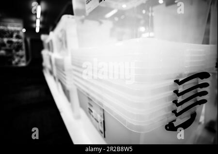 Rows of stacked plastic containers for organization and storage. Stock Photo