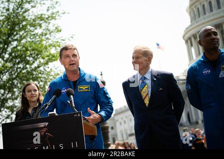 Washington, USA. 18th May, 2023. Nasa Astronaut Reid Wiseman speaks to media during a press conference on the NASA Artemis II mission with CSA President Lisa Campbell, left, and NASA Administrator Bill Nelson, right, outside the U.S. Capitol, in Washington, DC, on Thursday, May 18, 2023. (Graeme Sloan/Sipa USA) Credit: Sipa USA/Alamy Live News Stock Photo