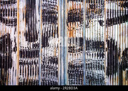 Street photography of back alley corrugated steel wall. Stock Photo