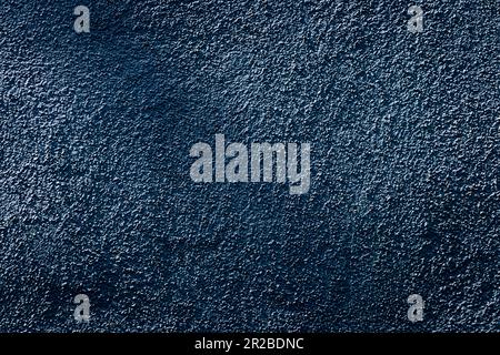 Blue-Black Stucco With Diagonal Shadow Stock Photo