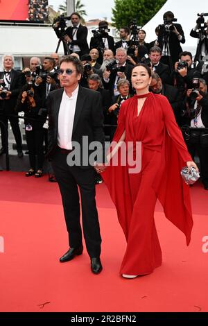 Cannes, France. 18th May, 2023. Jean-Michel Jarre and Gong Li attends the 'Indiana Jones And The Dial Of Destiny' red carpet during the 76th annual Cannes film festival at Palais des Festivals on May 18, 2023 in Cannes, France. Credit: Sipa USA/Alamy Live News Stock Photo